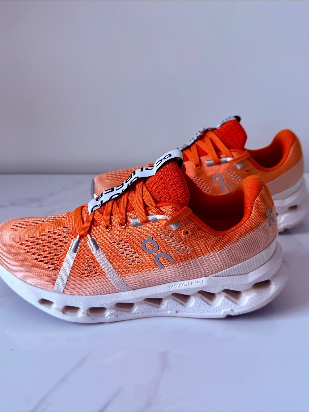 On Cloudsurfer 2 Women’s Size 6.5 in the vibrant Flame and White colorway